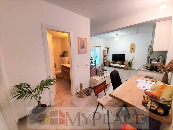 ברחוב שקט דירת גן בבניין משוחזר 3