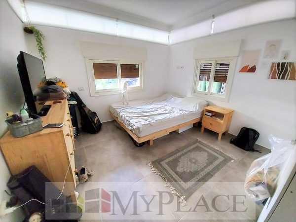 ברחוב שקט דירת גן בבניין משוחזר 6