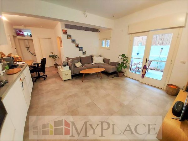 ברחוב שקט דירת גן בבניין משוחזר 2