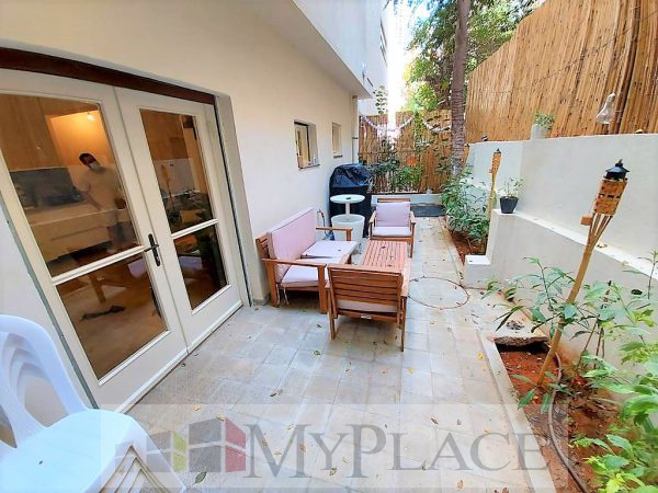 ברחוב שקט דירת גן בבניין משוחזר 1